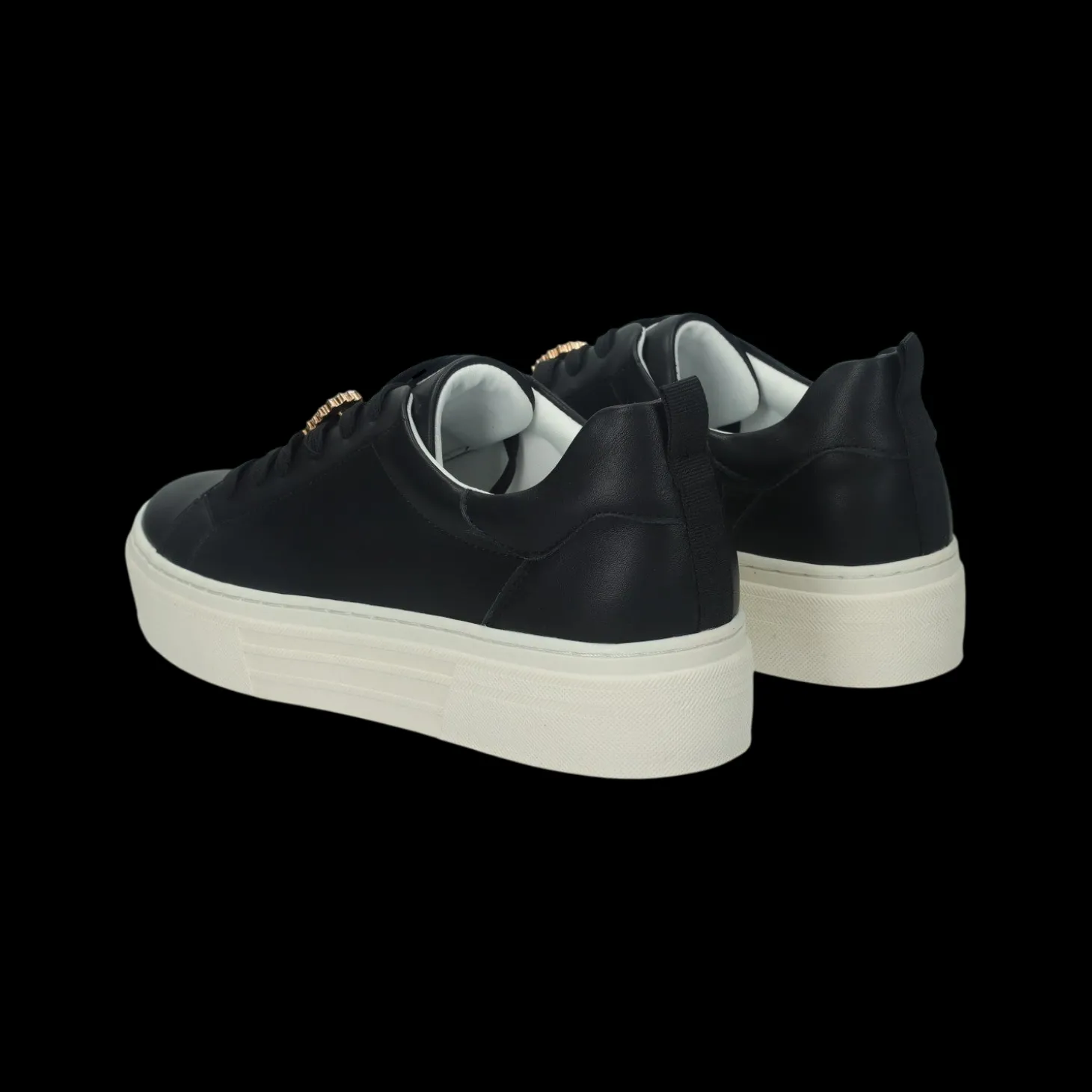 Sneakers con dettaglio in gioiello.Tacco alto 4 cm
